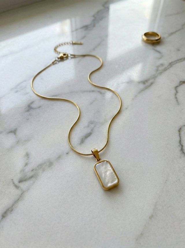 THE GEMINI SHELL NECKLACE IN GOLD (REVERSABLE) (WATERPROOF & 18K GOLD PLATED)